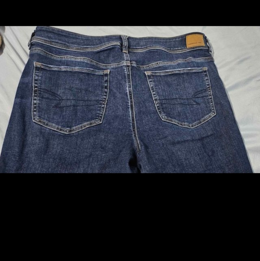 American Eagle slim boot cut jeans sizes avail. 18, 16, 14, 12. 2 pair each size